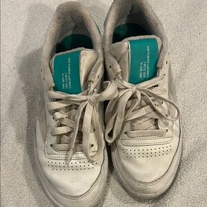 White Sneakers with Teal Accents